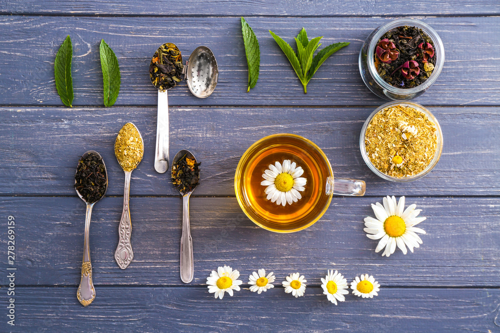 Assortment of teas on grey wooden background