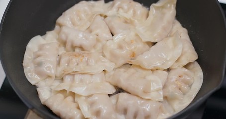 Canvas Print - Fry meat dumpling on pan