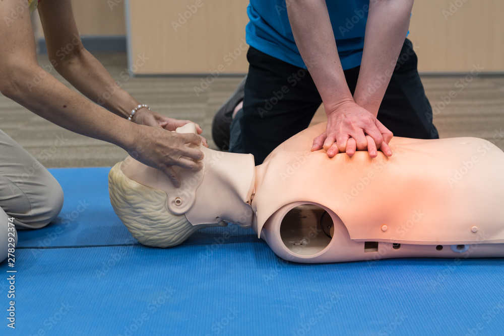 Demonstrating CPR (Cardiopulmonary resuscitation) training medical ...