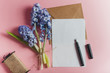 © Lauren Naefe/Stocksy - Bouquet of flowers with stationery