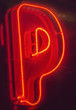 © Igor Madjinca/Stocksy - neon letter p