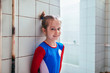 © MIHAJLO CKOVRIC/Stocksy - Portrait of young girl in locker room