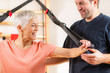 © Microgen - Senior Woman Exercising on TRX