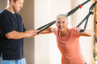 © Microgen - Senior Woman Exercising on TRX