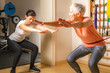 © Microgen - Senior Woman Doing Squats