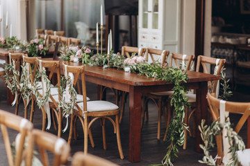 Boho wedding chair with eco decor for guests.