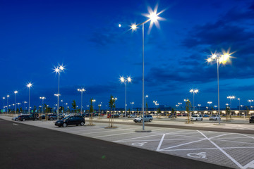 Canvas Print - big modern empty parking lot at night