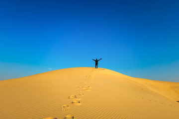 Wall Mural - Adventure Photographer in Desert Dammam Saudi Arabia