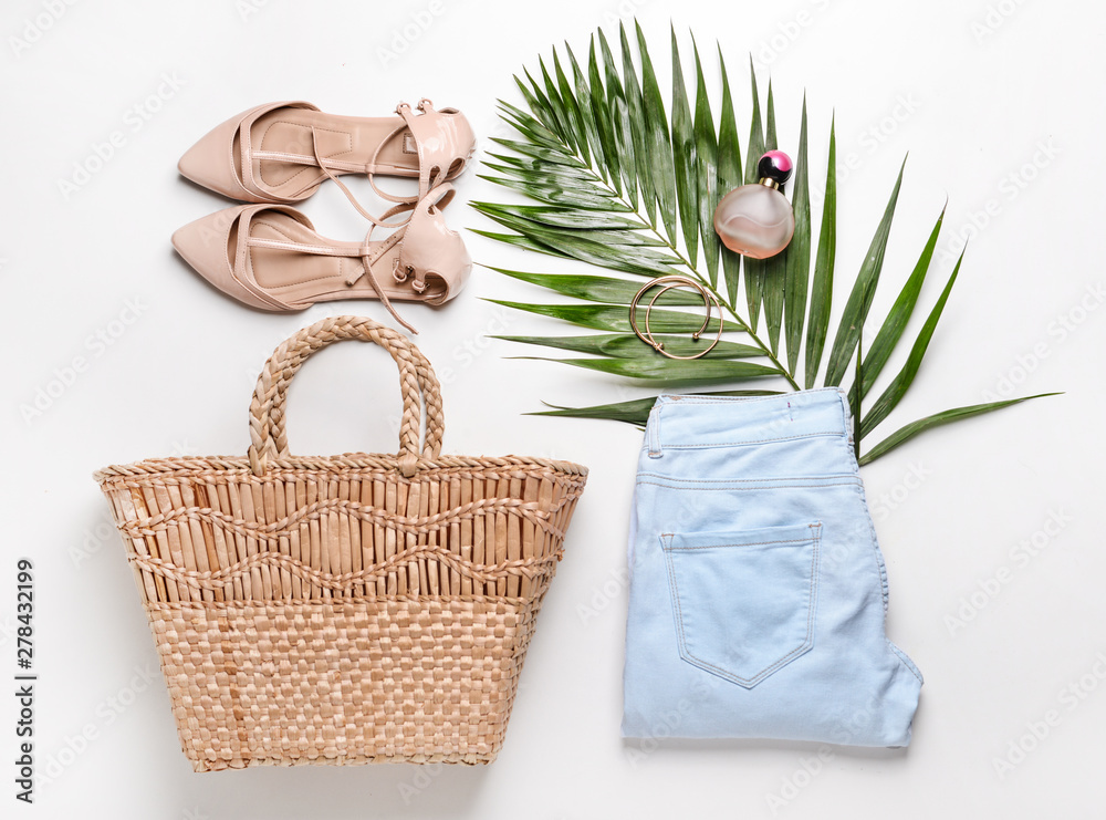 Stylish female look with jeans clothes on white background