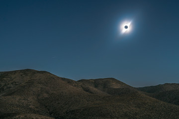 Wall Mural - total solar eclipse at atacama desert 2 july 2019. a view of the totality phase with the sun corona 
