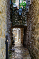 Poster - Picturesque narrow streets of the Old town in Budva Montenegro in the Balkans on the Adriatic Sea