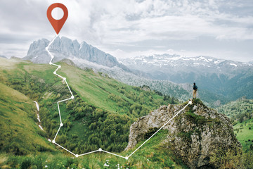 Wall Mural - Hiker young woman standing on cliff and scheme of GPS track.