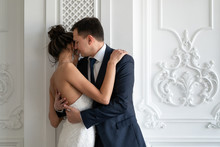 Bride And Groom Hugging Passionately. Newlyweds Close To Each Other. Emotionally Husband And Wife. Wedding Images Of Bride And Groom.