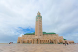 Fototapeta  - The Hassan II Mosque is a mosque in Casablanca, Morocco. It is the largest mosque in Africa, and the 5th largest in the world. Its minaret is the world's tallest minaret at 210 metres.