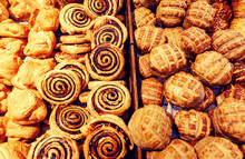 Mixed Bread Rolls Buns Coil With Cocoa, Sweet Dessert On The Left Side And Salted On The Right - Fresh Scandinavian Christmas Cakes