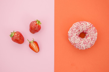 Top view donut vs fruit