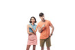 © LIGHTFIELD STUDIOS - young, smiling man and woman looking away and pointing with fingers isolated on white