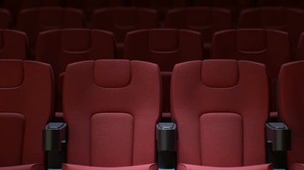 Wall Mural - Seamless Red Chairs in Cinema Hall. Looped 3d Animation of Rows of Red Seats in Cinema with DOF Blur. Art and Media Concept. 4k Ultra HD 3840x2160.