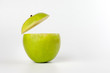 Healthy Green Cut Apple floating top slice juice drink idea concept on white background