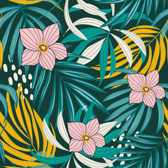 Bright abstract seamless pattern with colorful tropical leaves and flowers on green background. Vector design. Jungle print. Floral background. Printing and textiles. Exotic tropics. Fresh design.