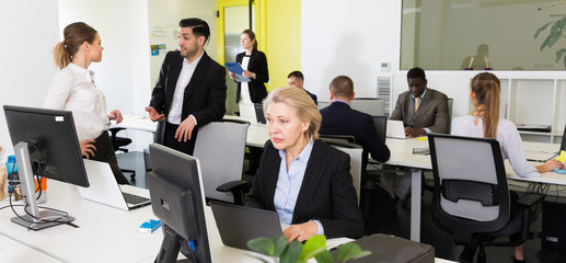 Wall Mural - Business people working in coworking space