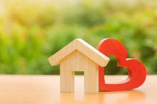 House With A Red Wooden Heart. House Of Lovers. Parental Hospitable Home. Housing Construction Of Your Dreams. Buying And Renting Real Estate. Affordable Housing For Young Families, Support Program.