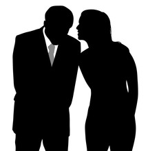 Man And Woman Discreet Conversation