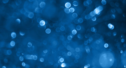 Wall Mural - blue festive beautiful abstract background with bokeh lights