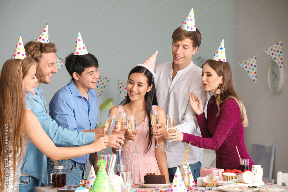 Group of friends celebrating Birthday at home