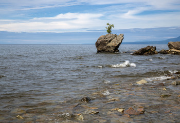 Wall Mural - Nature Monument Crag Stone Turtle on lake Baikal in Eastern Siberia, republic Buryatia