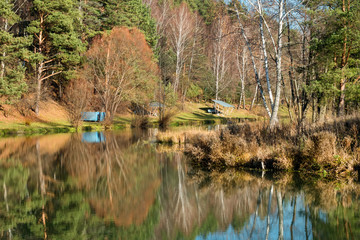 Autumn forest river water panorama. Natural color.