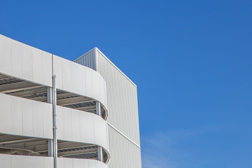 Modern building on a sunny day with a blue sky. 