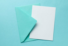 Green Envelope And Blank Letter On Green Background. Template With Place For Text On Postcard. Mock-up