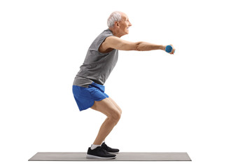 Poster - Senior man exercising squats and holding dumbbells