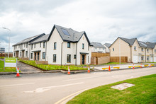 Newly Built Energy Efficient Houses With Solar Panels On The Roof  On Sale In A Housing Estate In UK