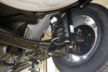 Rear Suspension Of A Modern Car. Elements And Design Of The Rear Suspension. Rear Suspension Beam, Spring, Shock Absorber.