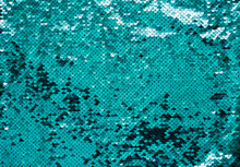 Luxury Background Made Of Turquoise Sequins. Shiny Fabric Texture