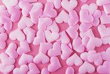 Many volumetric hearts on a pink background for Valentine's Day with love