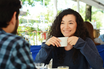 Couple enjoying a coffee at the coffee shop