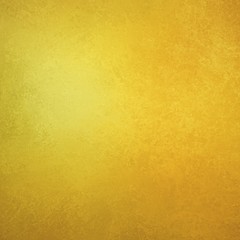 Wall Mural - Gold background, shiny yellow texture in old vintage background design that is elegant and luxurious