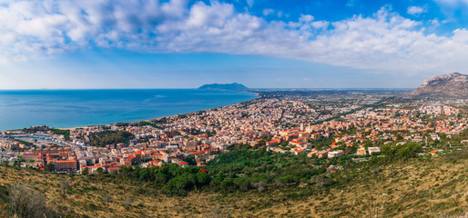 Wall Mural - Panoramic sea landscape with Terracina, Lazio, Italy. Scenic resort town village with nice sand beach and clear blue water. Famous tourist destination in Riviera de Ulisse