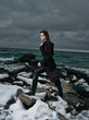 © SHOTPRIME STUDIO - young woman sitting on a rock
