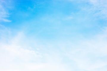 Wall Mural - blue sky background and white clouds soft focus, and copy space