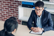 © weedezign - interviewer interview candidate apply for job at meeting room in office.