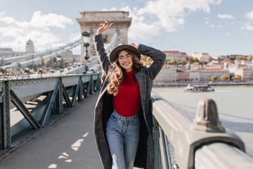 Wall Mural - spectacular white woman with beautiful dark hair enjoying life during vacation in europe. portrait o
