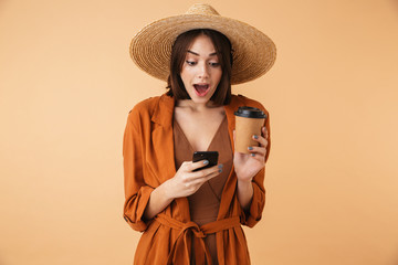 Beautiful young woman wearing straw hat