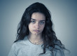 © SB Arts Media - Human expressions and emotions. Young sad teenager woman looking depressed and hopeless.