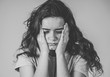 © SB Arts Media - Human expressions and emotions. Young sad teenager woman looking depressed and hopeless.