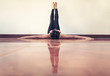 Blurred background of Yoga Woman feet up on wall relaxing, unrecognised person.