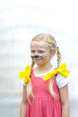 Wall Mural - smiling girl with face painting of mouse